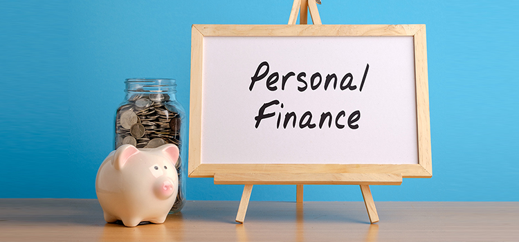Picture of piggy bank and a sign saying personal finance